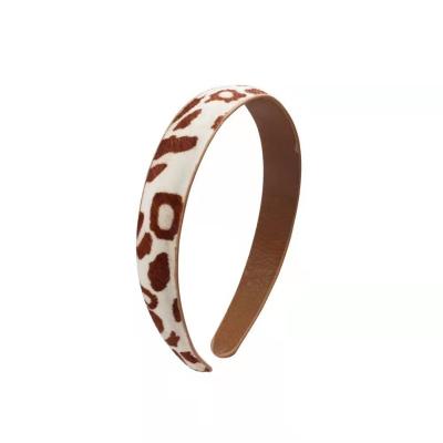 China Vintage Autumn And Winter Leopard Printing High Color Collision Toughness Women Non-slip Leather Headband for sale