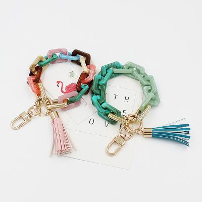 China Easy Personality Clash Color Square Button Tassel Combine Lady's Bag Accessories Metal Pendant Wrist Key Ring For Gift for sale