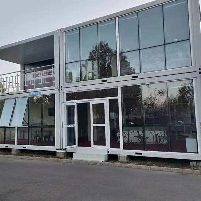 China Modern hot modular fashion real estate warehouse custom steel building house industry in china prefab container office housing hotel hou for sale