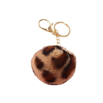 China Leopard Pom Pom Keychain Bulk Llavero De Pompom Bag Car Accessories Key Chain High Quality Plush Pendant Bag for sale