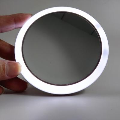 China USB Lighted Charging LED Compact Make Up Mirror With 3 Intensity Wireless Mirror Light Power Bank for sale