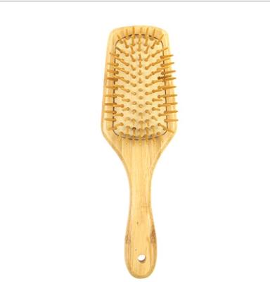 China Cushion paddle bamboo hairbrush with bamboo bristles for massaging the scalp for sale