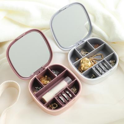 China Factory direct sales jewelry storage with mirror 7 compartment jewelry box lipstick earrings ring storage box for sale