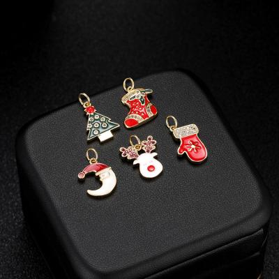 China TRENDY DIY Christmas jewelry charms 14K enamel brass Christmas tree paror plated hat bump elk shape charms for jewelry making for sale