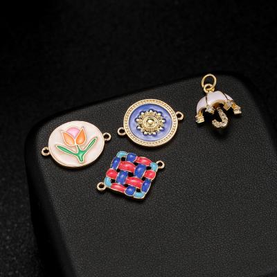 China FASHIONABLE Wholesale Enamel 14K Gold Plated Oil Drip Round Charms Sun Flower Connectors Charm Pendant For Jewelry for sale