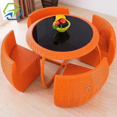 China Hot Sale Eco-Friendly Rattan Garden Patio Furniture Space Saving Dining Table And Chairs Outdoor Dining Set for sale