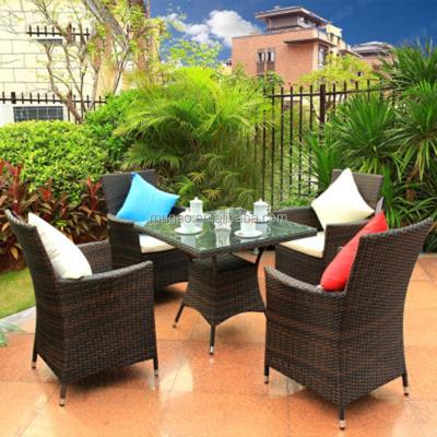 China Outdoor Outdoor Chair Set All Weather Waterproof Rattan Table and Chairs Set Restaurant Rattan Garden Furniture Set Dining Table Seating for sale