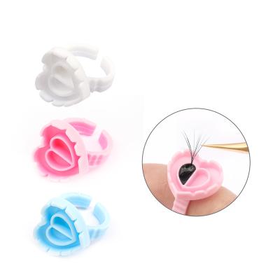 China XIUSUZAKI Wholesale 100Pcs/Bag Disposable Eyelash Extension Glue Ring Lash Tools Supplier Eyelash Glue Container Ring Cup Tattoo Pigment Holder for sale