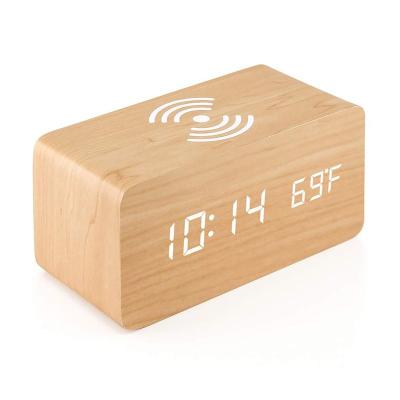 China Class Wooden Voice Control Table LED Digital Pendulum Alarm Clock Electronic Desk Clock with Led Display Wireless Charger for sale