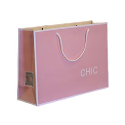 China Handmade Pattern Luxury Custom Made With Ribbon Handles Customized Logo Shopping Gift Paper Bag for sale