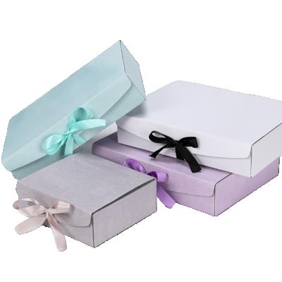 China Handmade Wholesale Luxury Custom Folding Mailer Box With Bow Private Label Apparel Packaging Box for sale