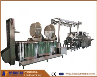 China Gezouten Pinda Gas Friteuse Machine 2000KGS/H Arachide Frituur- en Schilmachine Te koop