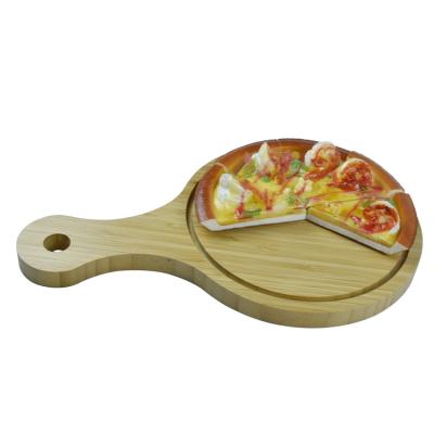 China Disposable Eco - Friendly Bamboo Peel Pizza Kitchen Serving Boards With Handle for sale