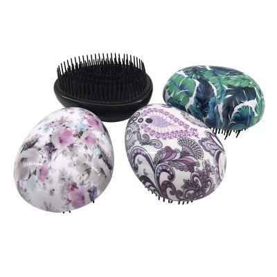 China Nondisposable Private Label Korean Egg Shape Detangling Hair Brush for sale