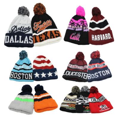 China JOINT Custom High Quality Fashionable Acrylic Winter Hats Warm Plain Dyed Skullies Pom Pom Knitted Beanie for sale