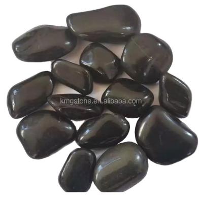 China Modern factory wholesale quality asphalt landscape tumbled black cobblestones and pebbles for foreigner paving for sale