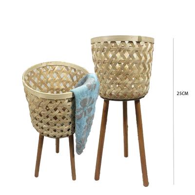 China 2021 Wholesale New Design Tripod Rattan Basket Kitchen Viable Wicker Baskets Clothes Storage Cheap Vegetable Storage for sale