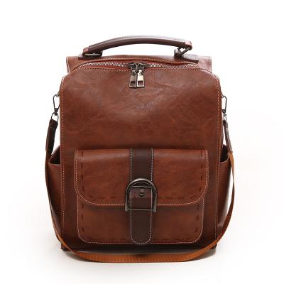 China Vintage PU Leather Waterproof Travel Laptop Bag Large Capacity Male Teenage Man Backpacks for sale