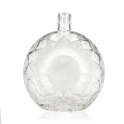 China 700ml Beverage Flint Liquor Wine Rum Brandy Transparent Round Empty Glass Whiskey Bottle With Sealed Lid for sale