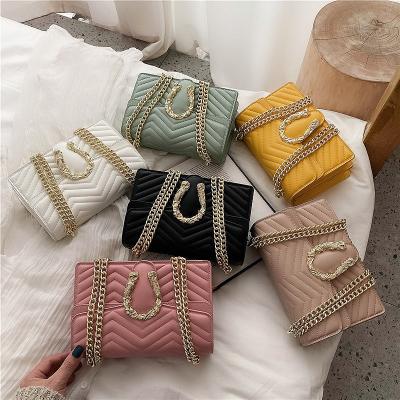 China Stylish Easy Carry Designers Solid Color Genuine Leather Small Jelly Original Luxury Handbag Famous Brand Striped Clutch Sling Bag for sale