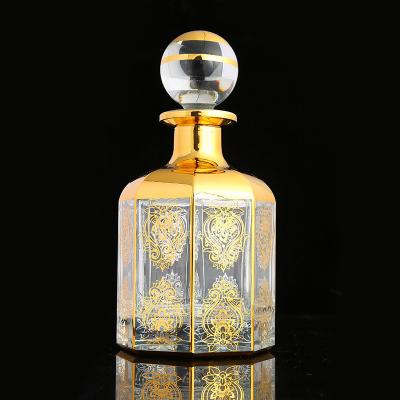 China China Stock 450ml Gold Perfume Bottle Glass Silvery Engraving Empty Bottle for sale