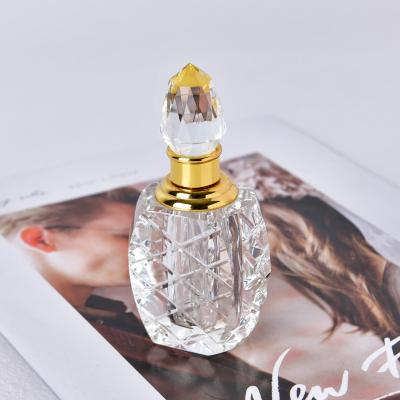 China China 100 Style Essential Oil Bottle Perfume Bottle 3ml 6ml 12ml K9 Crystal Empty Crystal Perfume Bottle for sale