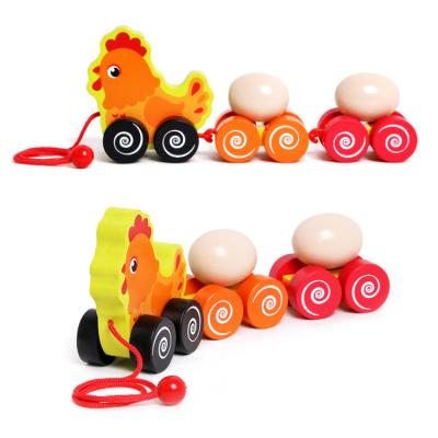 China Wooden Toddler Hen Wooden Hand Push And Baby Practice Animal Pull Toys for sale