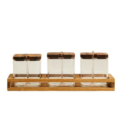 China Acacia Wood Sustainable Rack Set 3 Condiment Jar Rack Spice Salsa Glass Jar Seasoning Glass Jam Jar Clear Glass Container for sale