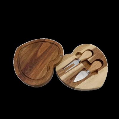 China Sustainable Luxury Customize Logo Solid Acacia Wood Cheese Board With Knife Set Cheese Serving Board With Cutlery for sale