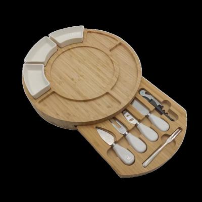 China Multifunctional Sustainable Newcomer Round Bamboo Wooden Charcuterie Board With Ceramic Bowls And Cheese Knife Set Board With Drawer for sale