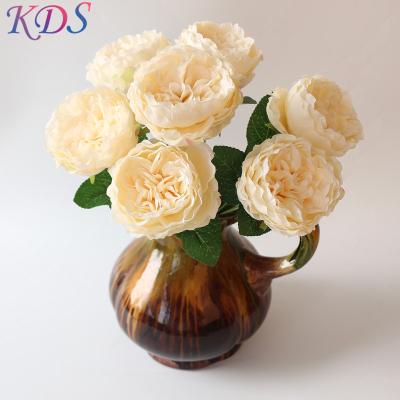 China Hotsale high quality fabric 7 heads rose plants to wedding table artificial flower for home decor for sale