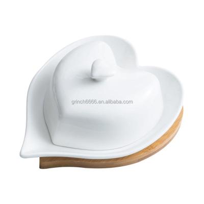 China Viable Butter Keeper Ceramic Dish Heart Shaped Ceramic Dish With Handle Lid Dishwasher Safe Holder Other Wedding Decorations for sale