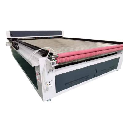 China Engraving and Cutting 100w/150w /170w Garment/Cloth/Textile/Leather/Home Cloth Laser Cutting Machines with Automatic Rolling and Feeding System for sale