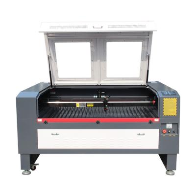 China Engraving And Reducing 1610 Co2 Fabric Cloth Laser Cutting Machine Price for sale