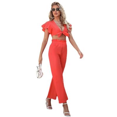 China 2022 Summer Solid Color Navel V-Neck Breathable Canvas Tie Cotton TopTwo Piece Leakproof Pants Set Suit for sale