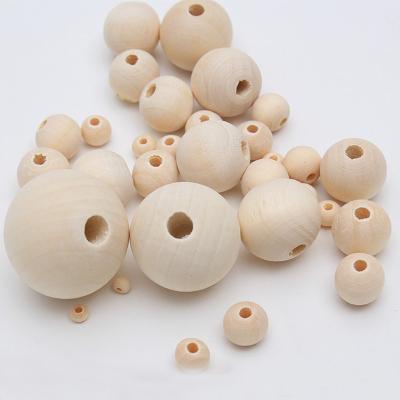 China Diy Decoration 4/50mm Teething Wooden Beads Natural Color Round Lotus Wood Beads Bulk Various Sizes for sale