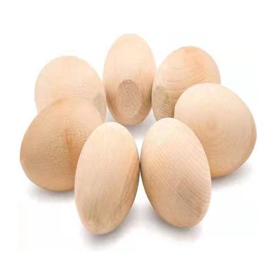 China Manufacturers from Europe supply egg shaped crafts made of maple wood and can be in size customized unfinished wooden egg food toys craft for sale