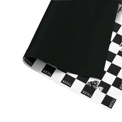 China Clear And Elegant International Black And White Checkered Flower Gift Wrapping Checkerboard Pattern Flower Wrapping Paper for sale