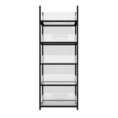 China Display product for store Miniso style display layer shelf promotional display rack for toys cases bags and daily chemicals for store for sale