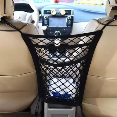 China Universal Stretch Mesh Bag Space Saving Storage Mesh Bag Between Car Seats Car Elastic Pet Barrier Divider 3 Layers for sale