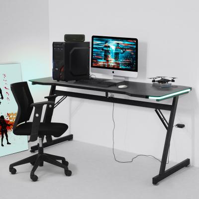 China Ergonomic Stylish Carbon Fiber Panel PB Metal Leg Set Finished Desk With LED Light for sale