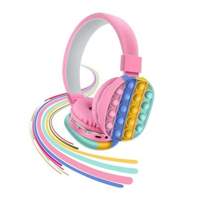 China new cute silicone Head-mounted head-mounted sensory toy rainbow sensory headphones bubble headphones for sale