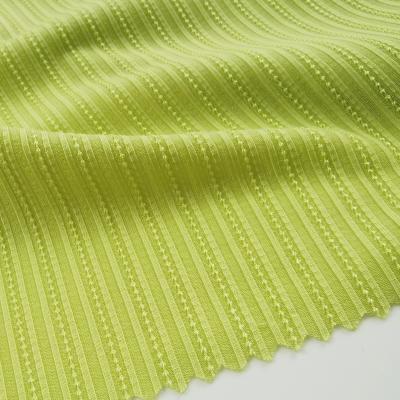 China 2021wholesale anti pill jacquard polyester fabric green rib knitting fabric for women dress for sale