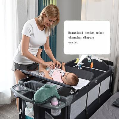 China Metal hutch splicing crib baby bedside large removable crib multi-function portable folding baby crib newborn bed for sale