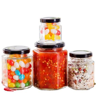 China 100ml 180ml 280ml Hexagonal Glass Food Jars For Sauce With Screw Metal Lid for sale