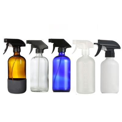 China Silicone 16oz Cosmetic Sleeve Amber Brown Blue Frosted Glass Spray Bottle With Trigger Spray Top for sale