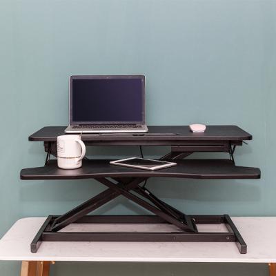 China (Size) Modern Manual Height Adjustable Sit Stand Adjustable Table Elevating Desk For Computer for sale