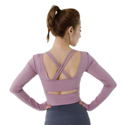 China Breathable Fall/Winter Yoga Dress With Chest Pad Tight Hollow Out Back Beauty Design Quick Dry Sexy GYM Routine Wear Long Sleeves T Shirt for sale