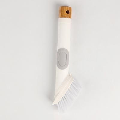 China Sustainable Pet Stiffens White Color 23cm Bamboo Dispensing Kitchen Dish Cleaning Brush for sale