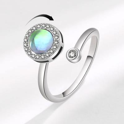 China Nickel-Free Lead-Free Luxury Delicate Natural Blue Oval Cut Halo Cubic Zirconia Adjustable Spinner Ring For Women Colorful Opal Rotating Rings for sale